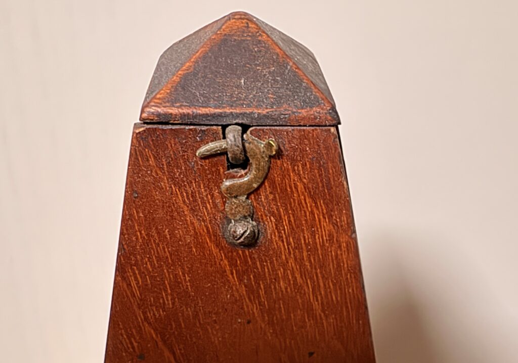 metronome metal latch detail